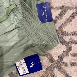 fluttery mid-rise shorts with biker shorts underneath